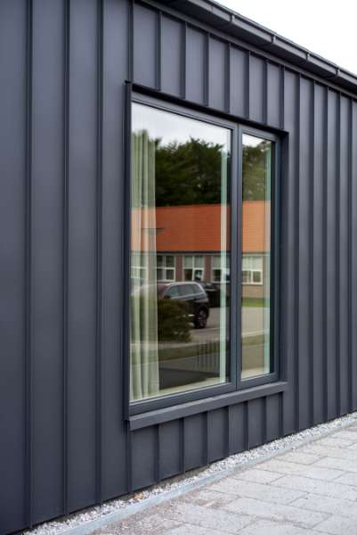 Steel and wood annex for extra space for ‘loaning out’ at Risskov Library, Risskov Bibliotek - Fortebakken 1, 8240 Risskov